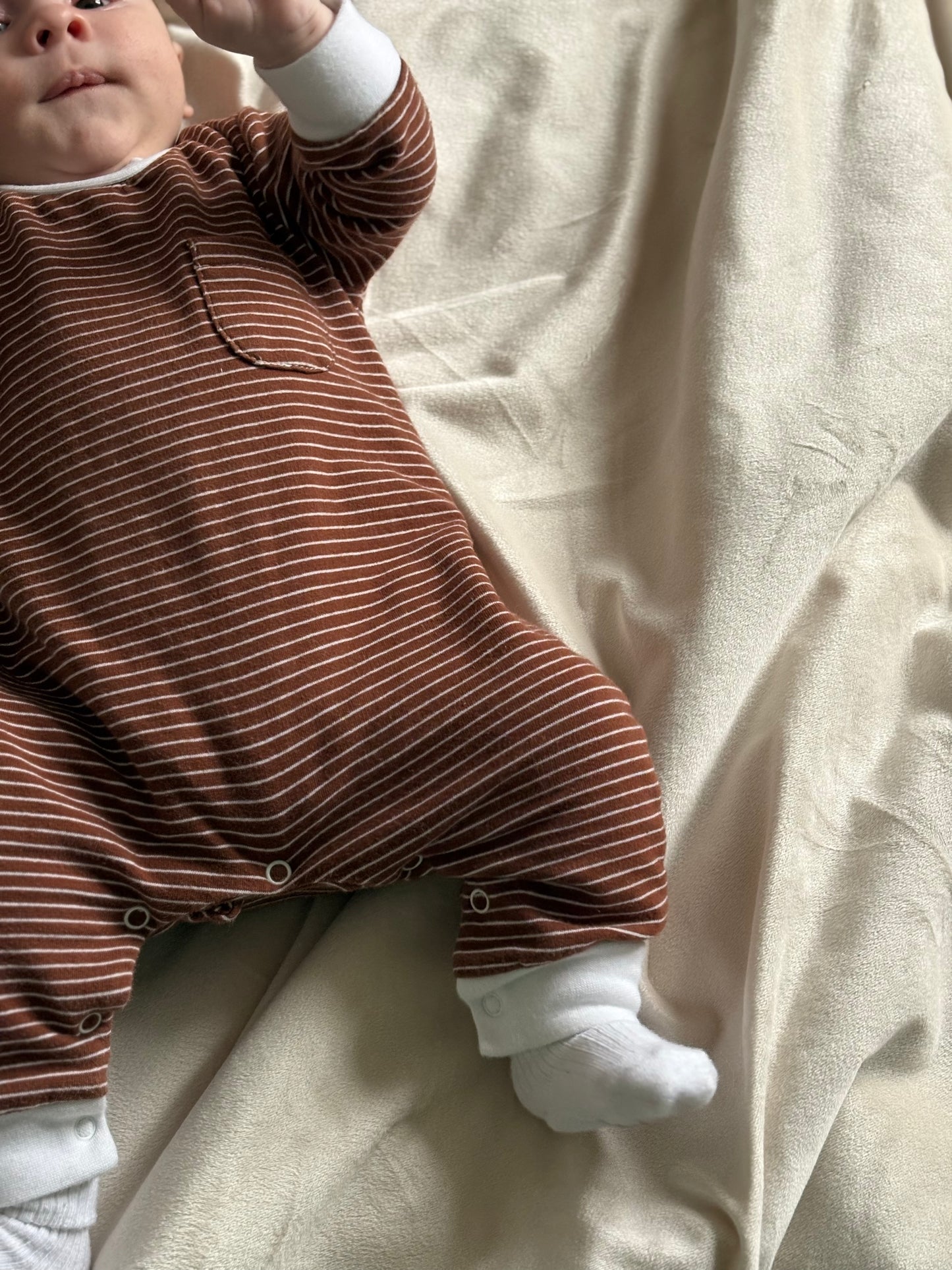Brown striped sleep suit, modelled on 3 month old baby