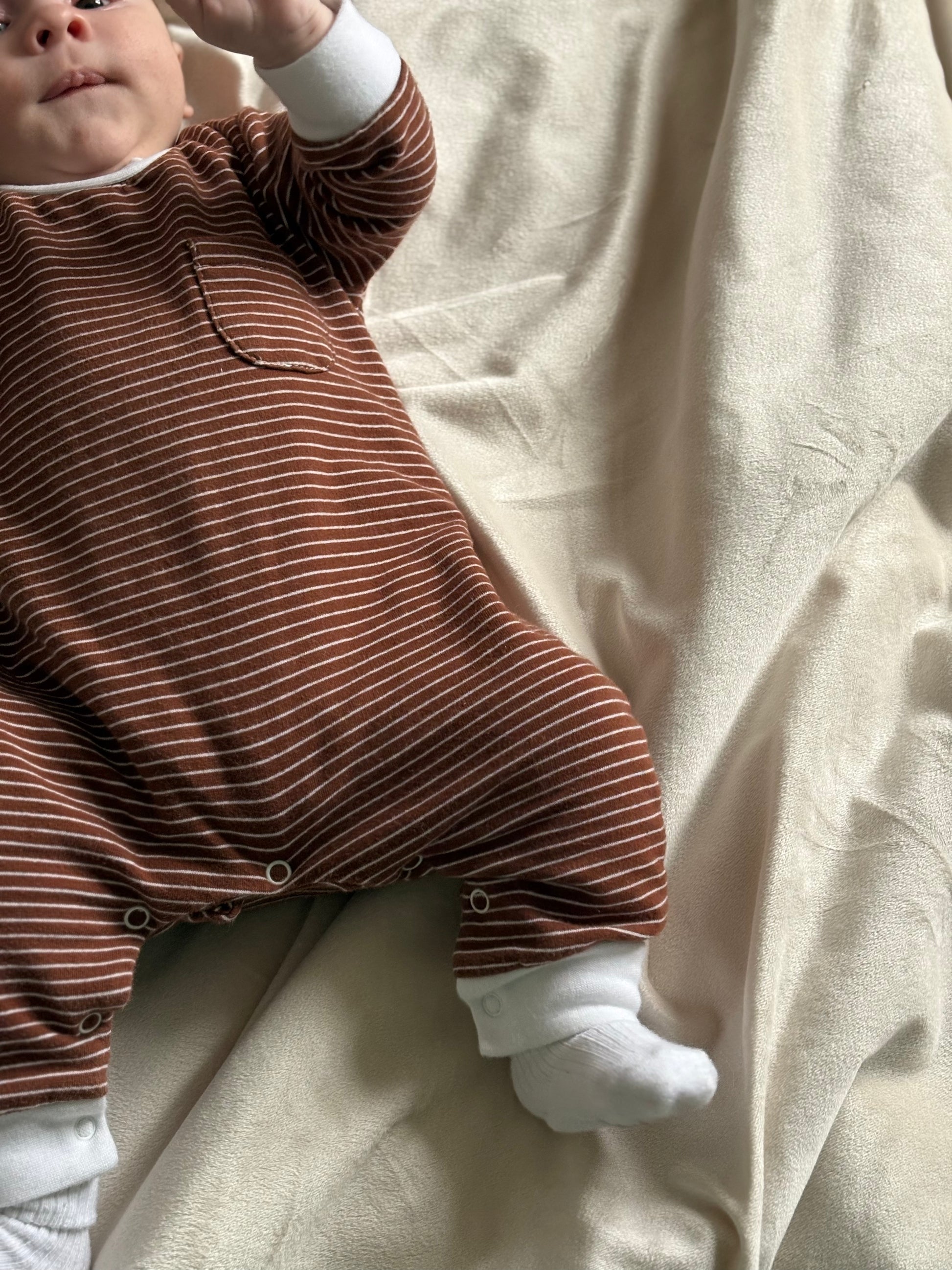 Brown striped sleep suit, modelled on 3 month old baby